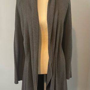 Long Sweater. beautiful greige color tone.Worn very little. Like New condition.